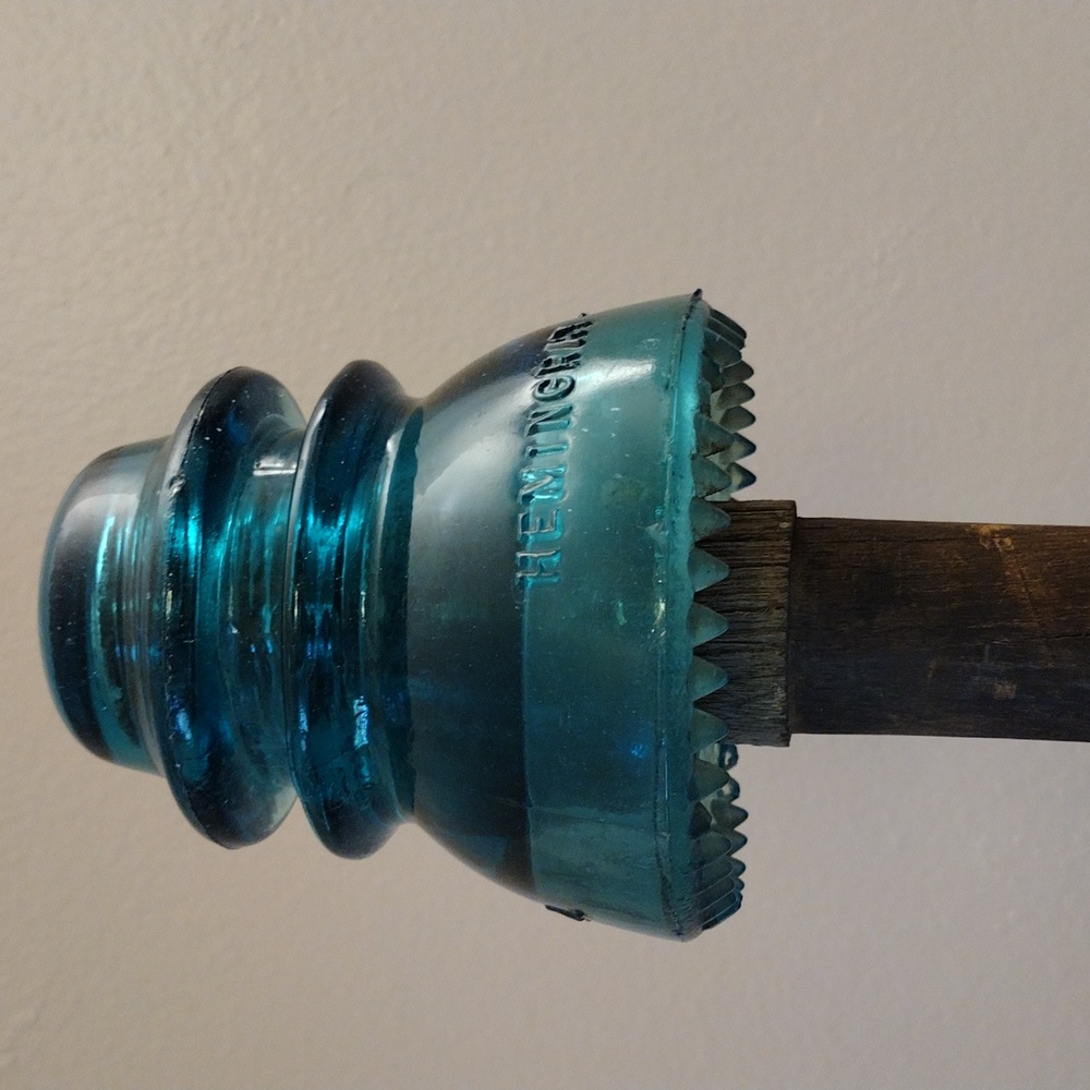 Hemingray No 42 Green Glass Insulator with Wooden Pole